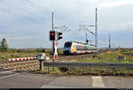 Bahnübergangs-Szene mit 9442 103 (Bombardier Talent 2) der Abellio Rail Mitteldeutschland GmbH als RB 74770 (RB75) von Halle(Saale)Hbf nach Lutherstadt Eisleben, die in Teutschenthal auf der