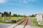 In einem Beschranktem Bahnbergang hat man den besten Blick auf das Gleis.