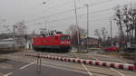 Lok 112 179 der DB Regio Nordost weilt derzeit im Ausbesserungswerk Dessau (LDX) und ist hier auf einer Probefahrt auf dem  AW-Anschlussgleis  am BÜ Elisabethstraße.