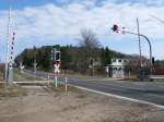 Bahnbergang  Nerzfarm ,am km 1,9,an der Strecke Bergen/Rgen-Lauterbach Mole,bei Bergen/Rgen,am 04.April 2011.