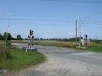 Bahnbergang an der Strecke Stralsund-Berlin in Richtung Zarrendorf am 13.Juli 2013. 