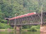 Ein RegionalExpress mit 143 von Koblenz nach Saarbrcken auf der Moselbrcke bei Bullay kurz vor der Einfahrt in den Prinzenkopftunnel.