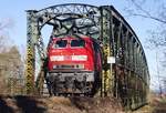 218 406-7 schiebt IRE 4229 von Stuttgart nach Lindau am 20.03.2011 zwischen Langenargen und Kressbronn über die Argenbrücke.