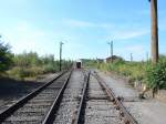 Blick vom Bahnübergang auf eine Fabrik.

Duisburg Landschaftspark 02.08.2015