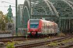 DB 423 551-1  D'r Zoch kütt  als S11 nach Bergisch Gladbach überquert die Hohenzollernbrücke in Köln, August 2025.