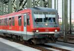 628 527 RB38 mitten auf der Hohenzollernbrücke nach K-Deutz - 31.07.2014
(Hohenzollernbrücke = Mitte Eisenbahn, rechts und links Fußgängerwege. Vom südlichen Aufnahme gemacht.)