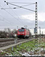 189 008-6 (Siemens ES64F4) beim Signalhalt im Betriebsbahnhof Holleben - gelegen am km 13,0.

🧰 DB Cargo
🚝 T 64695 Halle ZBA Süd–Buna-Werke
🚩 Bahnstrecke Merseburg–Halle-Nietleben (KBS 588)
🕓 12.1.2021 | 10:28 Uhr