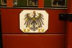 Eigentumsschild auf einem alten preussischen Rungenwagen, der in einer Fahrzeughalle im Eisenbahnmuseum Bochum-Dahlhausen steht......17.5.2012