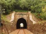 Westportal des Meineringhuser Tunnels, Strecke 3944, Bad Wildungen - Wega(er Mhle) - Korbach - Brilon Wald, aus Richtung Bahnhof Korbach Sd aufgenommen (etwa 1985, vom Bild eingescannt)