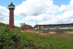 Der Wasserturm und der Ringlokschuppen des ehemaligen Verschiebebahnhofs Wustermark (heute Elstal) am 05.05.2019.