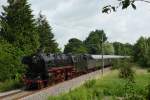 Die 01 1066 fuhr am 23.06.2012 mit einem Sonderzug nach Emden, hier bei der Einfahrt in den Bahnhof Leer.