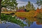 Die Dampflokomotive 01 2066-7 fährt in Breitungen mit einem Sonderzug vorüber.Bild vom 15.9.2016