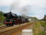 Der Heizhausexpress BR 03 1010-2 und BR 41 1144-9 bei der Abfahrt vom Bf Muldenberg/V. am 22.08.08.