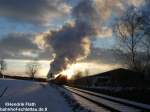 Das ist der eigentliche Nachschuss. Er hat sich durch die tiefstehende Sonne regelrecht angeboten.
50 3648-8 kurz nach der Ausfahrt aus dem Bahnhof Schlettau
Datum: 22.03.2008