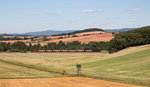 Mit Blick zum Mühlberg konnte 99 7245-6 der Harzer Schmalspurbahnen am 18.08.16 auf der Harzquerbahn fotografiert werden.
Noch verläuft die Strecke fast geradlinig und steigungsfrei durch´s Land. Dies ändert sich hinter Ilfeld, der nächsten Ortschaft allerdings. Lange Steigungen, umgeben vom schönen Harzer Wald und abschnittsweise ein Wildbach prägen dann ihren Charakter und ihr Umfeld.

Nur noch ein Mal täglich verkehrt ein Dampfzug im Abschnitt von Nordhausen Nord nach Eisfelder Talmühle u.z..
Auch auf der Selketalbahn herrscht eher spärlicher Dampfbetrieb, wenn nicht gerade zusätzlich ein musealer Sonderzug im Einsatz steht.
So kann man den Großteil der eingesetzten BR 99 auf der Brockenbahn Wernigerode - Brocken erleben. 