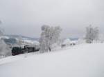 Winterferiendampf 2011 in Schnheide. Am 20.02.11 ist 99 516 bei der Ausfahrt in Schnheide zusehen, bei eisigen -10 Grad.