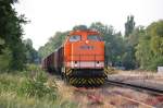 Locon Lok 209 kommt mit den leeren Waggons von wittenburg durch Hagenow gefahren.