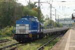 Spitzke V100-SP-009 (203 129-2) kommt mit einem leeren Schotterzug in Recklinghausen-S�d an 3.10.2026