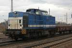 Spitzke V100-SP-009 durchfhrt am 19.3.10 mit einem Schotterzug Duisburg-Bissingheim