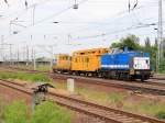 V100-SP-007 mit der NVR-Nummer  92 80 1203 115-1 D-SLG   in  Richtung Genshagener Heide nach dem passieren des Bahnhofes Berlin Schnefeld Flughafen am 29.