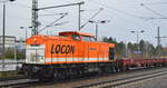 LOCON LOGISTIK & CONSULTING AKTIENGESELLSCHAFT mit  LOCON 220  [NVR-Nummer: 92 80 1203 614-3 D-LOCON] und zwei Drehgestell-Flachwagen am 28.01.20 Durchfahrt Bf. Flughafen Berlin Schönefeld. 
