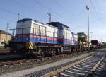 203 214-2 der Nordbayrischen Eisenbahngesellschaft steht am 7. Mai 2011 mit einem Bauzug im Bahnhof Lichtenfels.