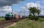 203 318-1 fuhr am 01.06.2012 mit einem Gterzug nach Emden, hier bei Veenhusen.