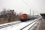 V160.7 (203 150-8) hvle - Havellndische Eisenbahn AG mit einem Uacns Ganzzug aus Premnitz, bei der Durchfahrt in Rathenow und fuhr in Richtung Wustermark weiter.