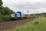 Spitzke's V100-SP-010 (203 146) mit Bauzug in Fahrtrichtung Norden. Aufgenommen zwischen Friedland(HAN) und Eichenberg am 14.06.2013.