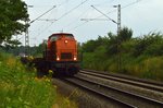 Eine mir unbekannte BBL 203 ist auf der Kbs 495 mit einem Flachwagenzug am Haken gen Neuss Güterbahnhof unterwegs. 13.7.2016