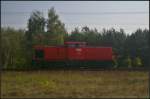 WFL Lok 26 / 203 120-1 dieselt solo am 16.09.2014 im vormittäglichen Dunst durch die Berliner Wuhlheide (NVR-Nummer 92 80 1203 120-1 D-ALS)