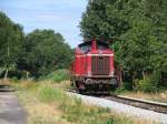 D25 (ex-DB 211 345-4) der Bentheimer Eisenbahn AG whrend eine Lokfahrt fr die Emslndische Eisenbahn GmbH zwischen Haselne und Meppen bei Bokeloh am 16-7-2010.