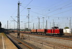 211 345-4 AIXrail steht in Aachen-West mit einem Schotterzug.