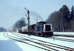 211 267-8 verläßt am 14.02.1983 mit einem Güterzug aus Pfullendorf den Bahnhof Altshausen in Richtung Aulendorf