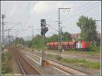 Am 26.05.2007 befand sich 212 270 der NbE mit einem Schotterwagenzug im Bauzugeinsatz am Bahnhof Frankfurt am Main-Niederrad, die gelben Gleisbaufahrzeuge sind im Bildhintergrund erkennbar. Am Gleis 3 stand das Signal bereits auf VR1 fr die S-Bahn nach Hanau. 