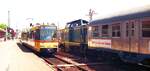 AVG Albtalbahn__Begegnung im Bf Bretten: Tw 803 [GT8-100C/2S; 1991 DUEWAG/ABB; +2022] und Lok 212 mit Silberling.__31-05-1994