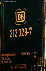 Welch glcklicher Zufall man fhrt von Mhldorf heim kommt in Villingen am Bahnhof Villingen vorbei und kann durch die Lcke im Zaun diese schne Frau Hundert erblicken. 212 329-0 von DB Services in Villingen 30.8.09 