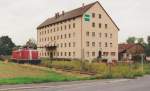 212 331 am 23.9.93 vor dem groen BayWa-Lagerhaus, das nrdlich vom Bahnhof Gutenstetten stand.