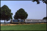 212263 ist hier am 27.7.1994 um 12.35 Uhr mit dem E nach Münster aus Warendorf kommend bei Müssingen unterwegs.