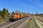 214 029 mit einem Schotterzug am 26.03.2017 bei Langenisarhofen. 