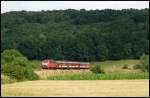 Die orientrote 218 156 war am 12.Juli 2008 mit dem ET 425 420 von Ulm Hbf nach Aalen unterwegs.