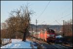 Die 218 156 und eine weitere 218er ziehen ihren InterCity nach Oberstdorf. Aufgenommen am Abend des 08.Januar 2009 bei Sen.