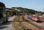 218 406 fhrt am 6.9.2009 mit einer DoStgarnitur in Biberach/Riss ein.