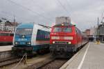 218 459-6 mit einem RE neben 223 064 der Alex mit einem Allguexpress nach Lindau Hbf in Mnchen Hbf am 30.05.2009