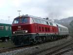 Im Rahmen der 175-Jahr-Feierlichkeiten der Deutschen Bahn zog die orientrote 218 387-9 den RE12077 Kln - Trier, hier kurz vor der Einfahrt im Bhf Gerolstein. Aufgenommen am 05/04/2010. 