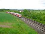 218 390-3 mit RE 3704 (BDER EXPRESS) von Hof nach Leipzig. Hier in der Steigung vor Herlasgrn/V. am 30.05.10.

