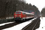 218 128-7 erreicht am 7.03.2010 mit einem RE von Kiel Hbf nach Lbeck Hbf Bad Schwartau.