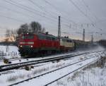 Mit ihrem Pilgerzug Richtung Alttting fuhren am 29.11.10 durch Mnchen - Riem die 218 465-3 und 218 105-5.