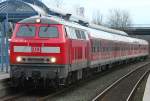 Die 218 139-4 zieht den RB23 Verstrker ber die Voreifelbahn von Rheinbach nach Bonn durch Meckenheim Industriepark am 14.01.2010