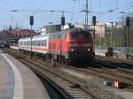 Leichtes Spiel fr die 218 315 mit dem Uex 2404 aus Kln und drei Kurswagen nach Heringsdorf,am 23.April 2011,bei der Ausfahrt aus Stralsund.